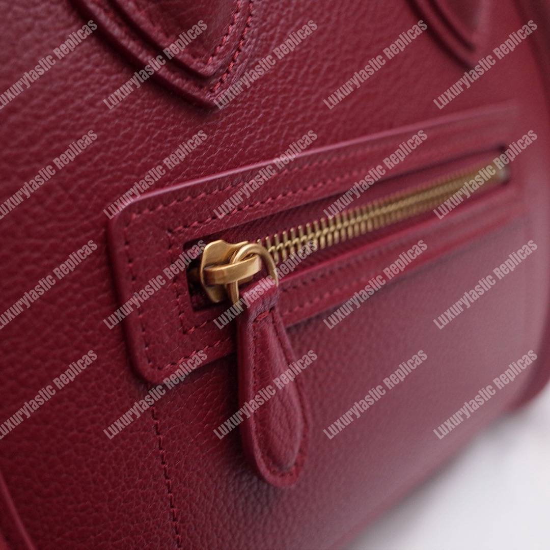 Micro Luggage Handbag In Drummed Calfskin Light Burgundy