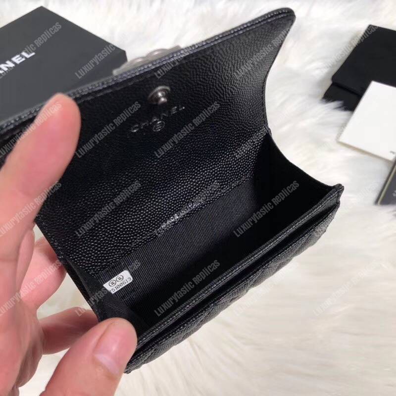 Ch*el boy small flap wallet black