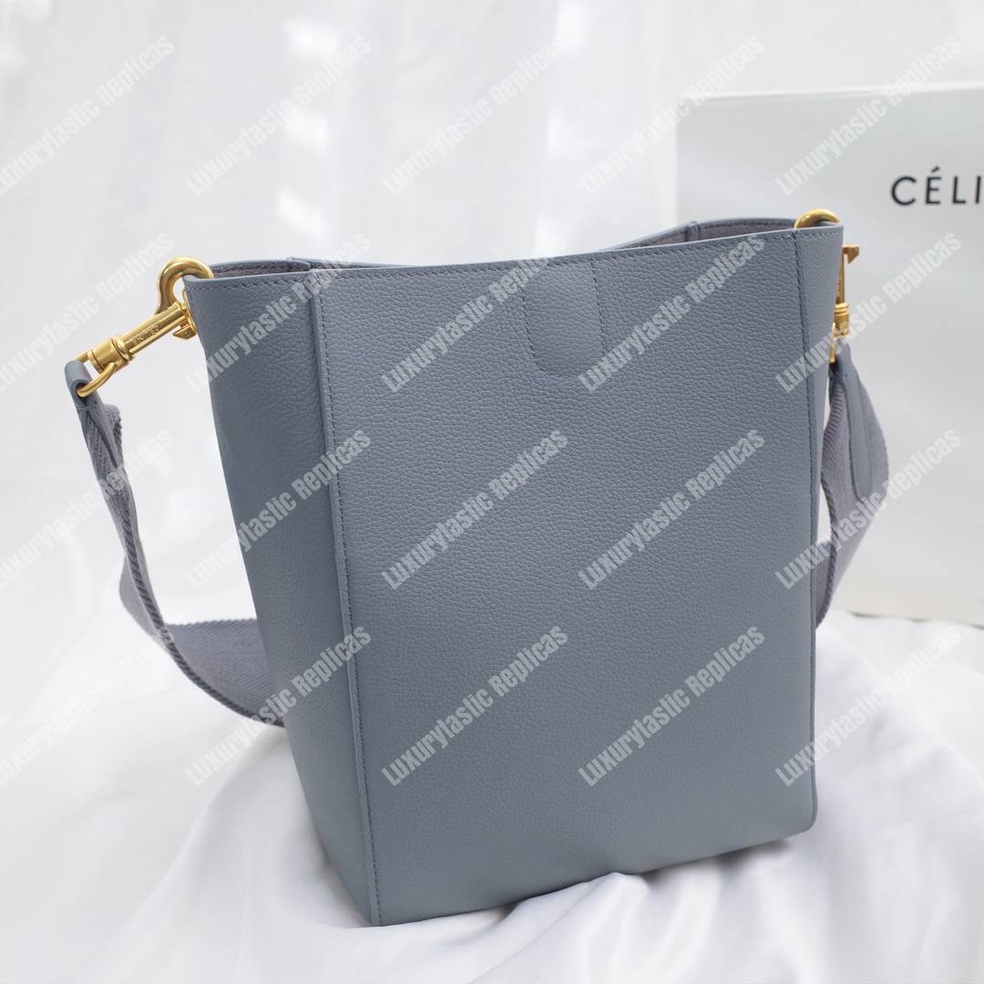 Ce**e sangle small bucket bag in soft grained calfskin cloud
