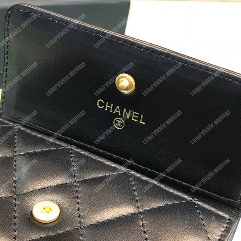 Ch*el boy small flap wallet black