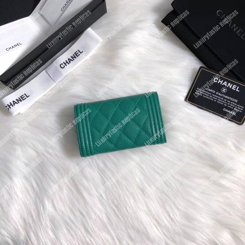 Ch*el boy small flap wallet green