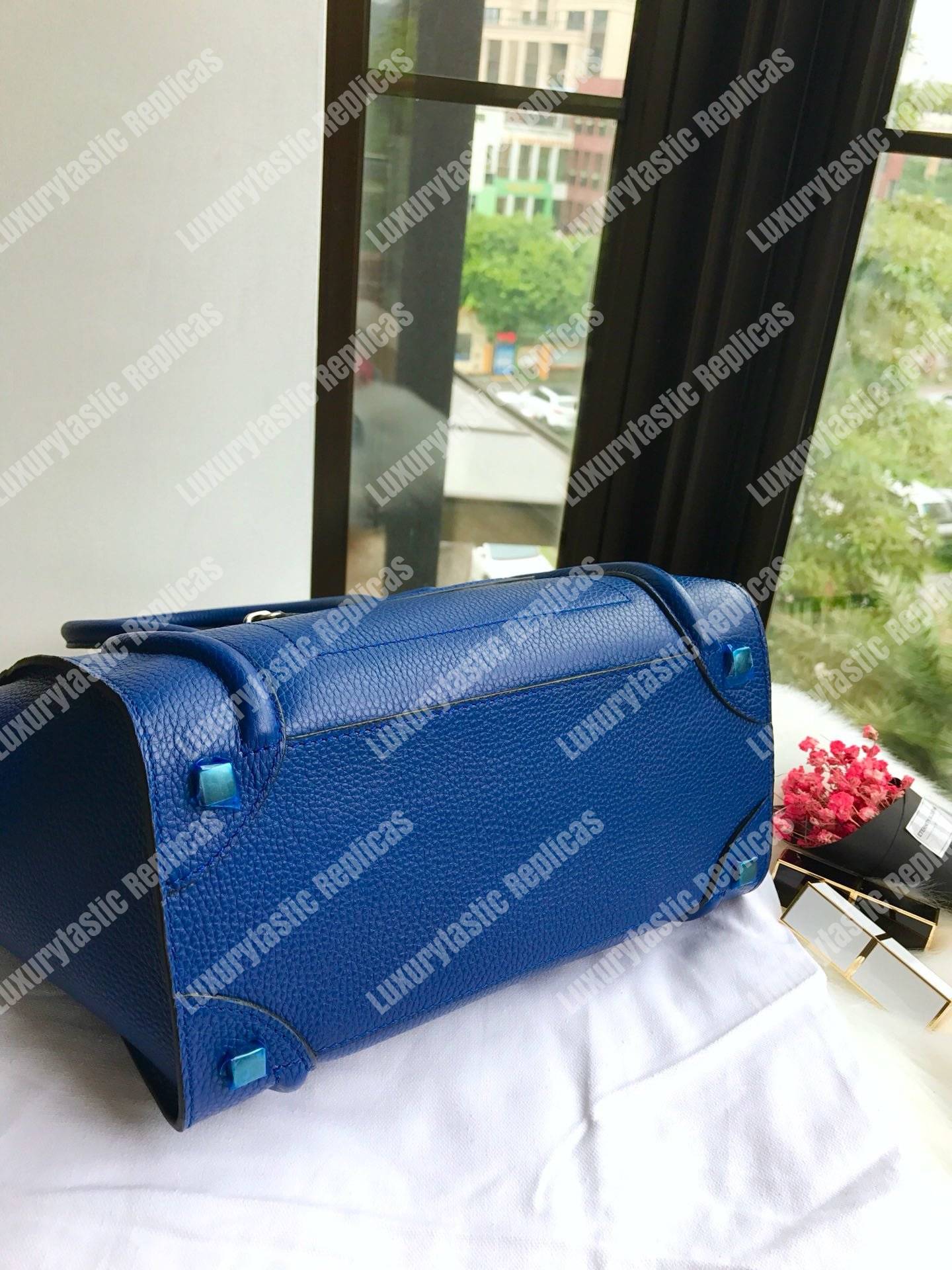 Ce**e micro luggage handbag in drummed calfskin petrol