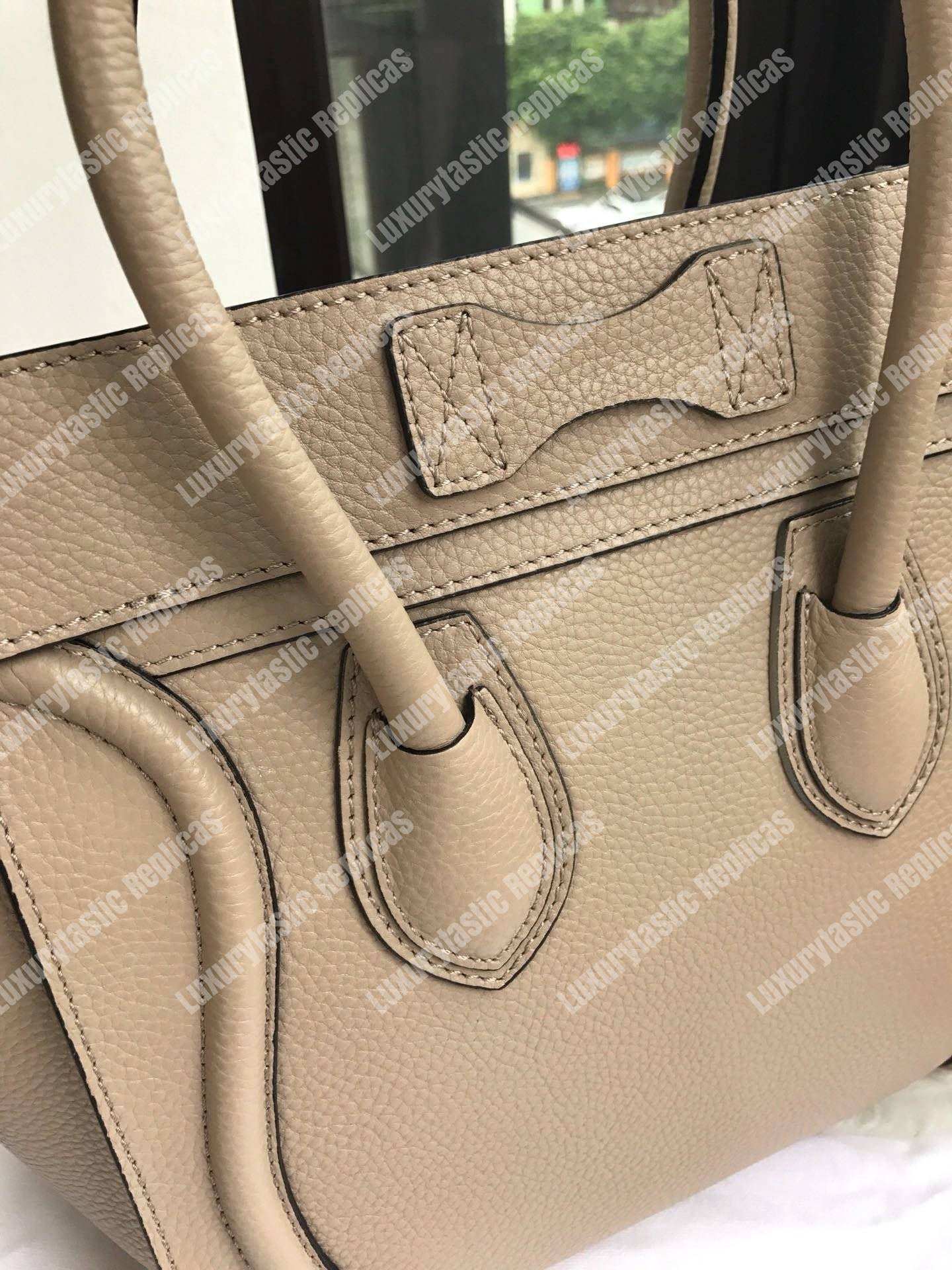 Ce**e micro luggage handbag in drummed calfskin dune