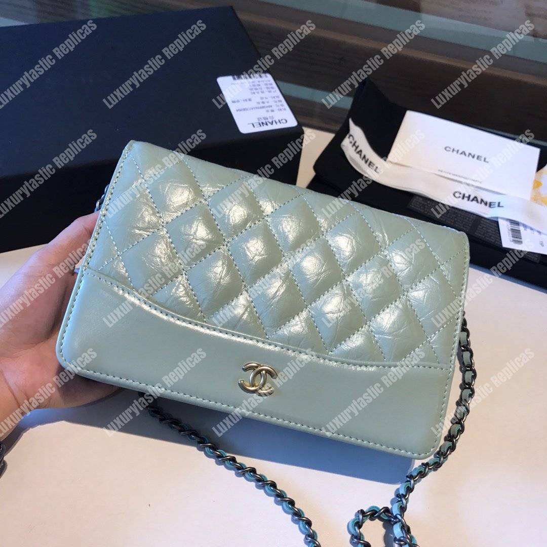 Ch*el wallet on chain – woc aged & smooth calfskin light blue