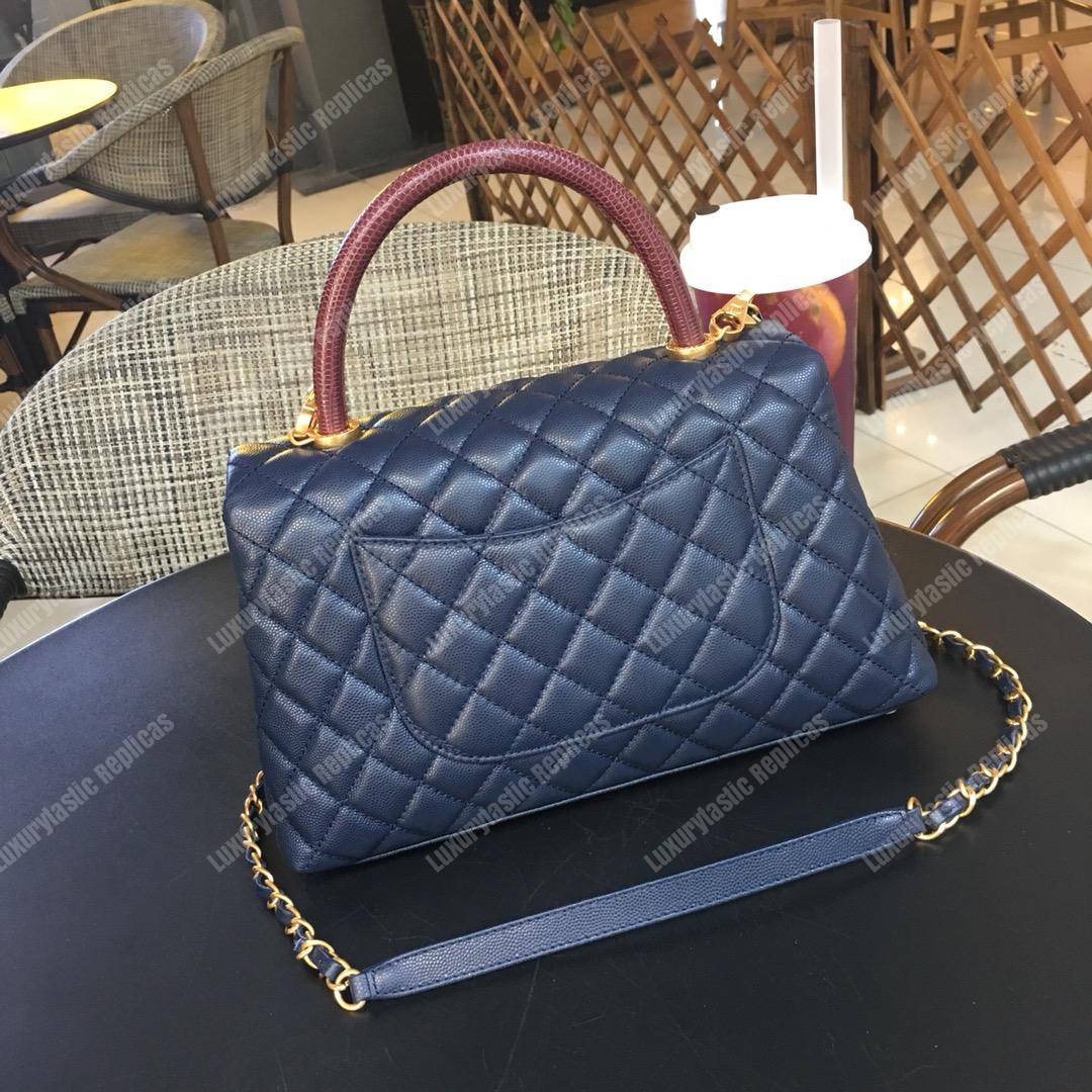 Ch*el flap bag with top handle navy blue