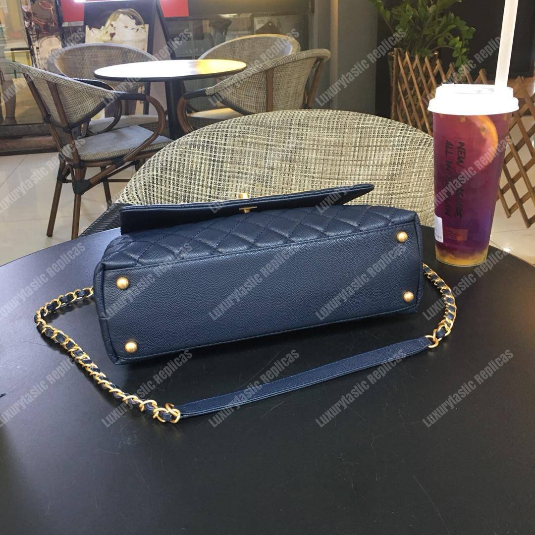 Ch*el flap bag with top handle navy blue