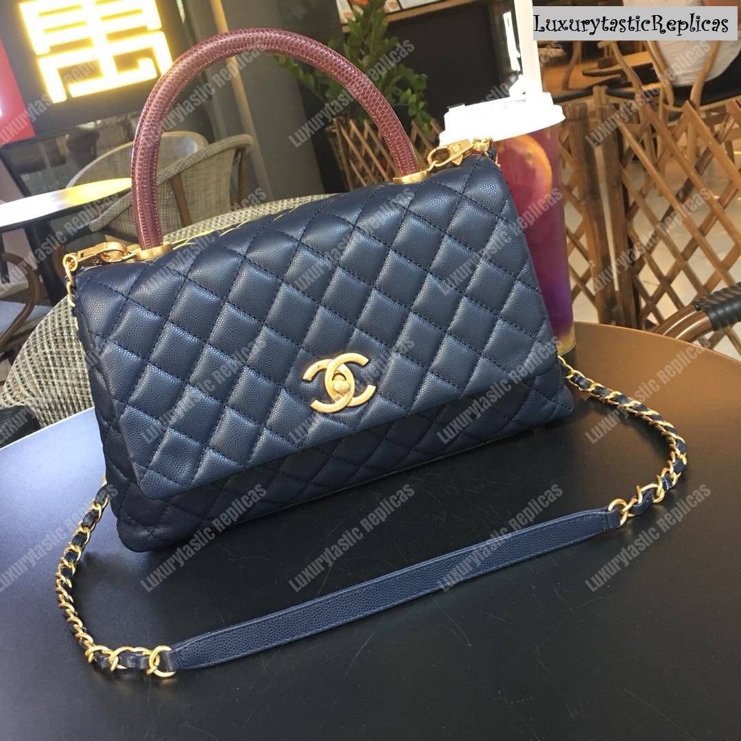 Ch*el flap bag with top handle navy blue