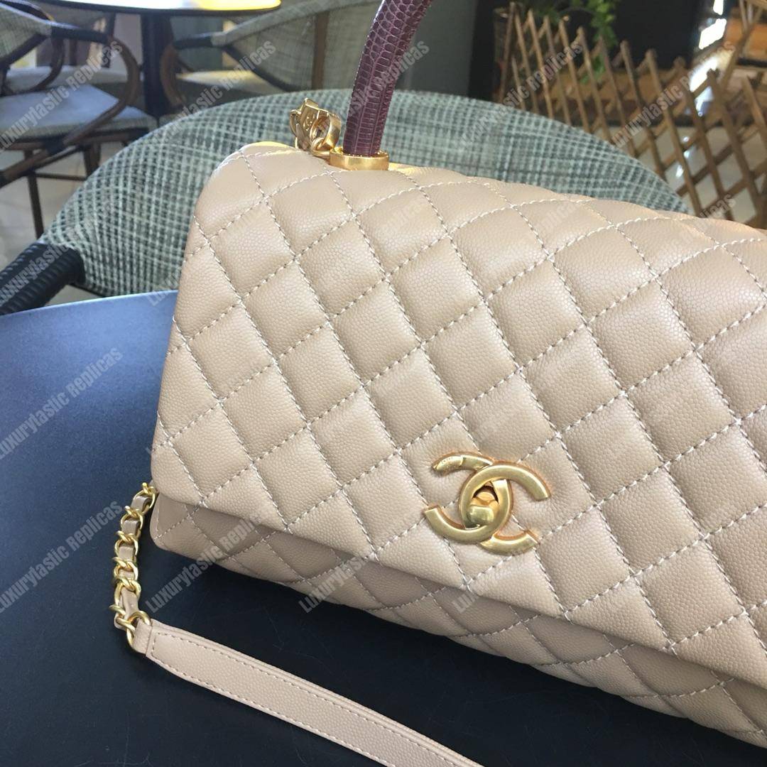 Ch*el flap bag with top handle beige