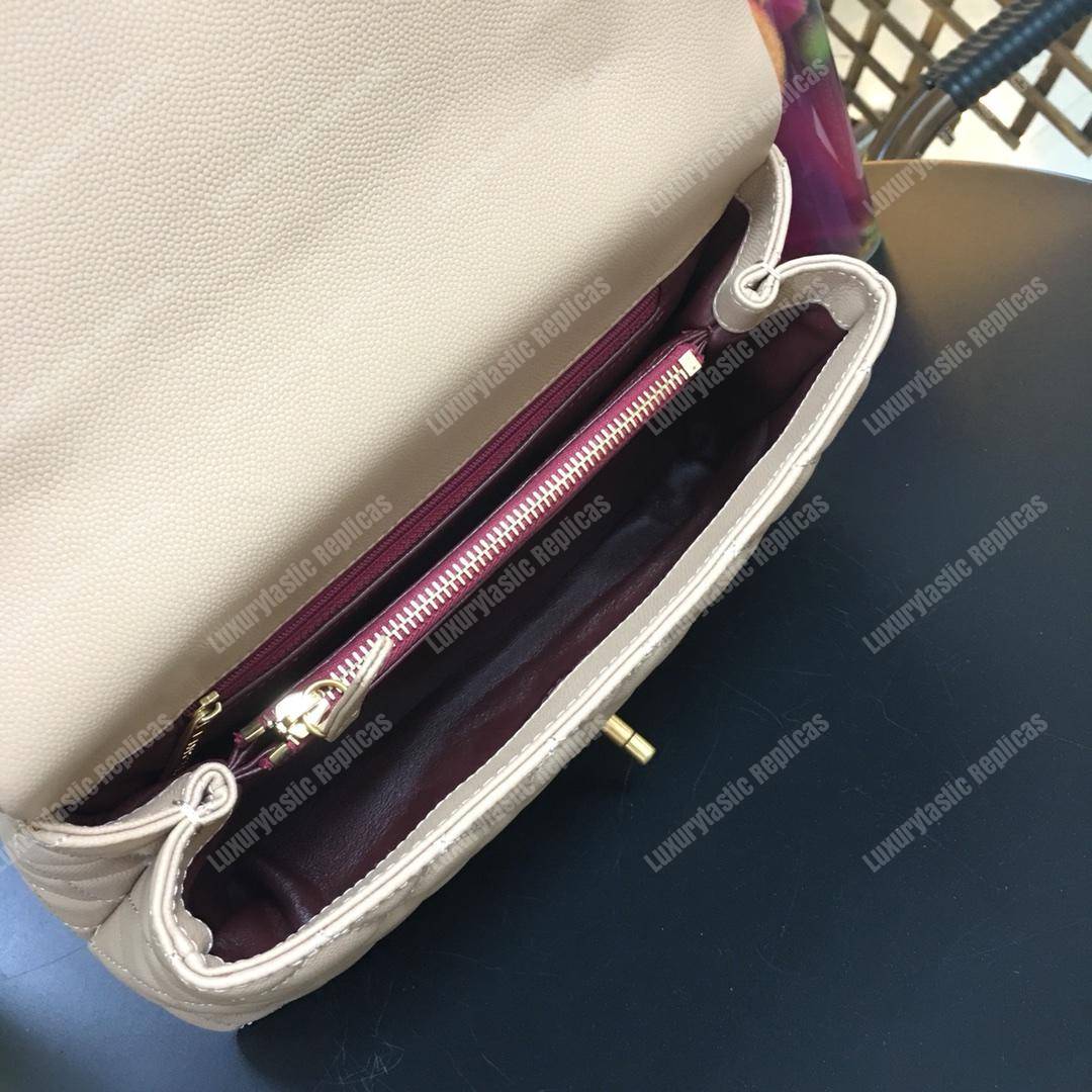 Ch*el flap bag with top handle beige