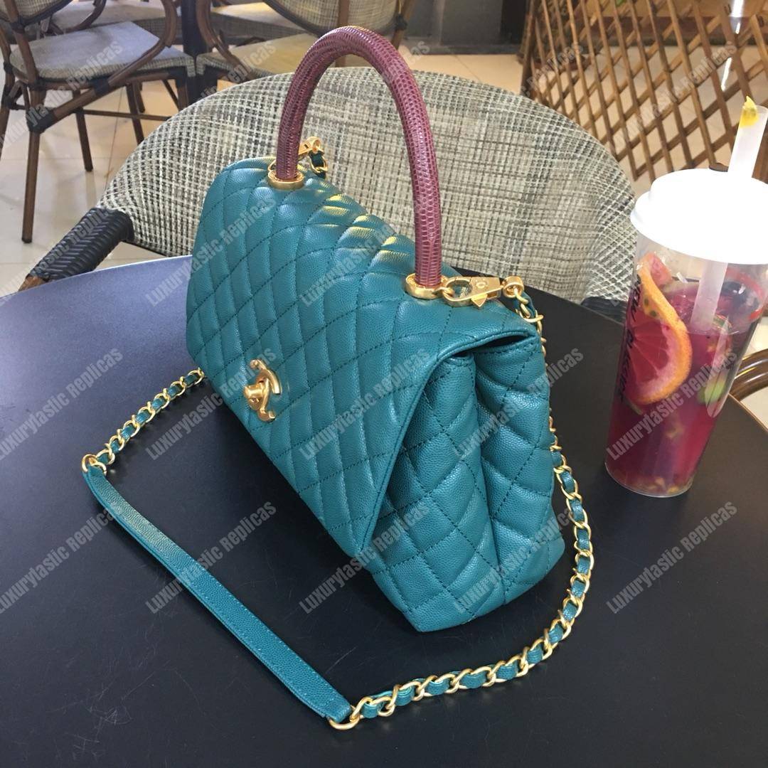 Ch*el flap bag with top handle blue