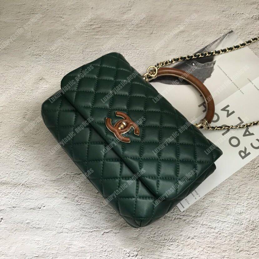 Ch*el flap bag with top handle green