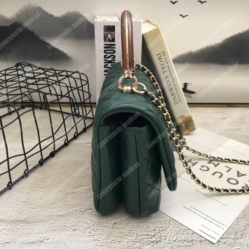 Ch*el flap bag with top handle green