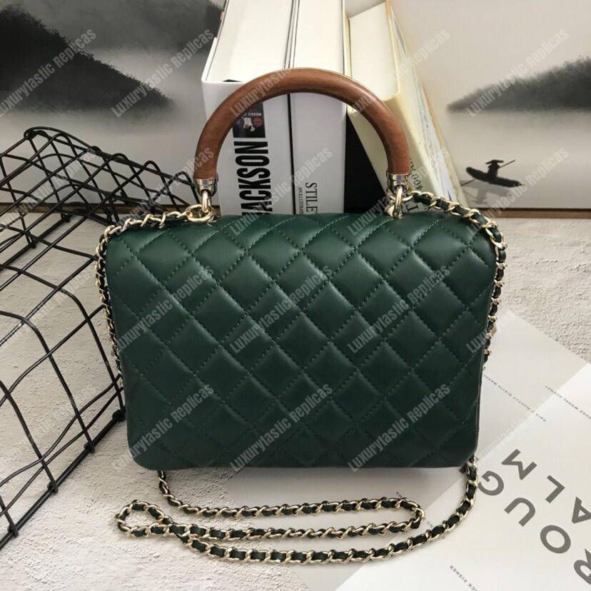 Ch*el flap bag with top handle green