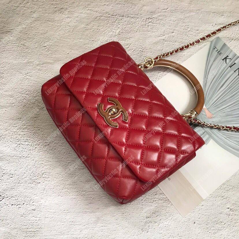 Ch*el flap bag with top handle red