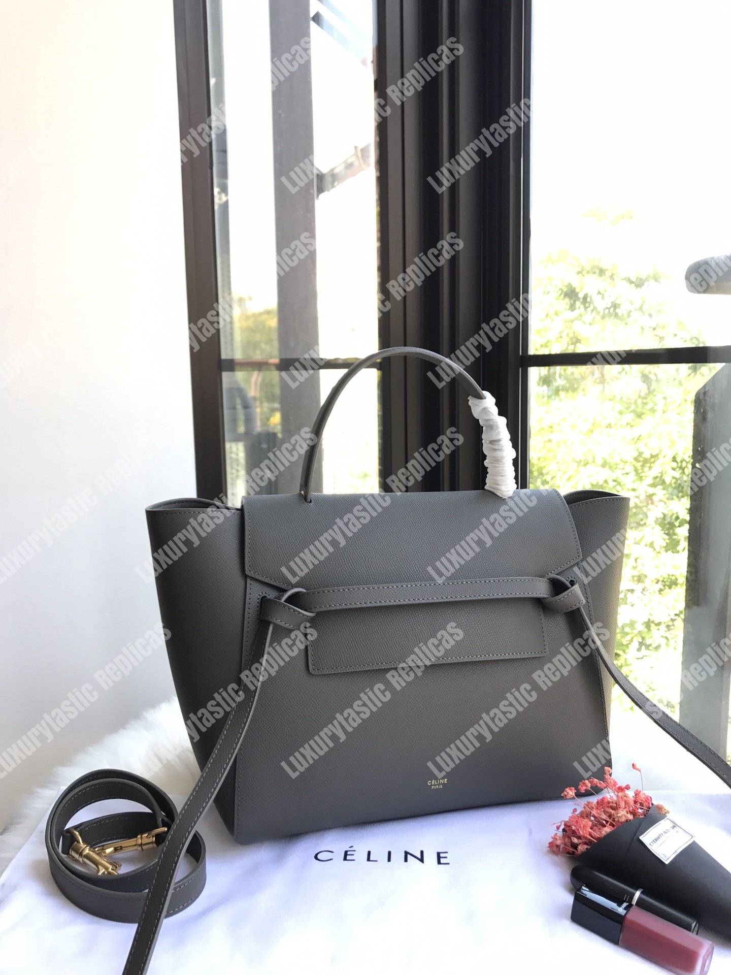 Ce**e mini belt bag in grained calfskin grey