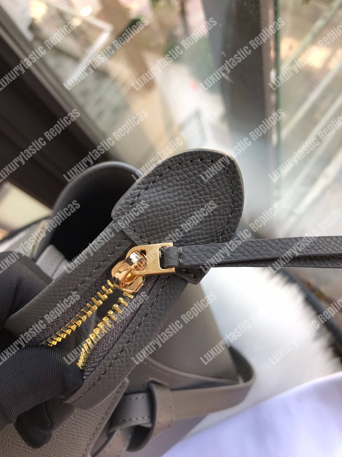 Ce**e mini belt bag in grained calfskin grey