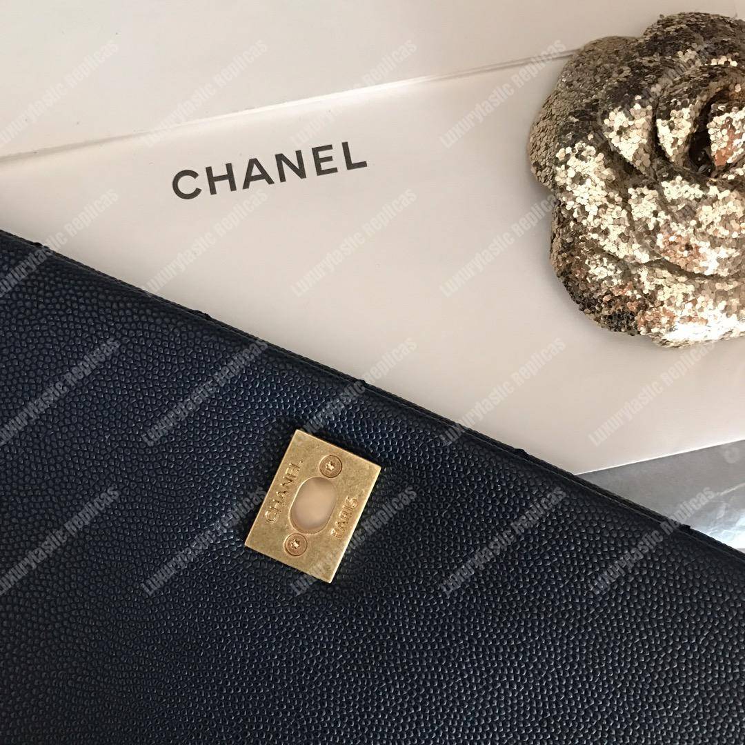 Ch*el flap bag with top handle navy blue