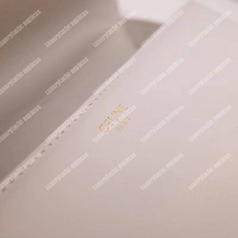 Ce**e medium triomphe bag in shiny calfskin white