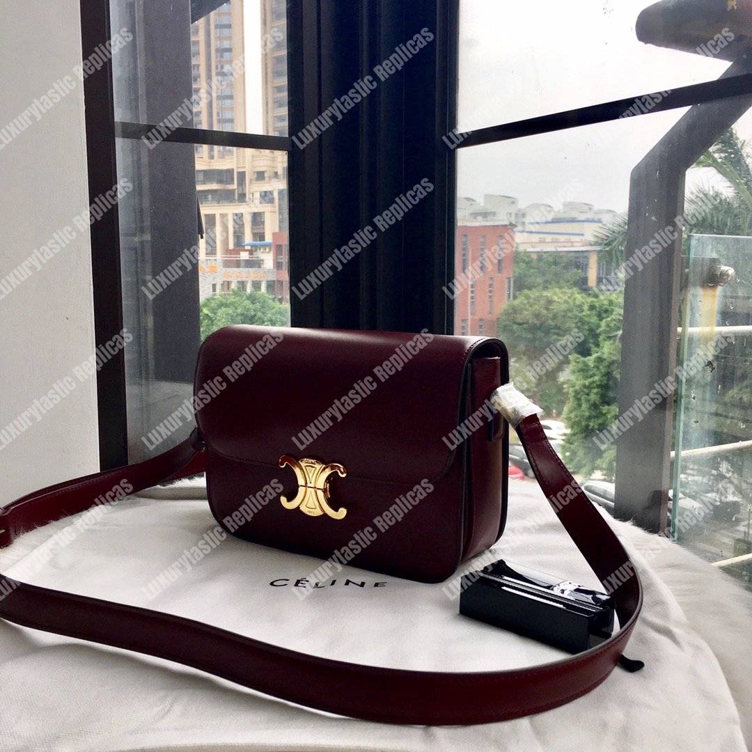 Ce**e medium triomphe bag in shiny calfskin burgundy