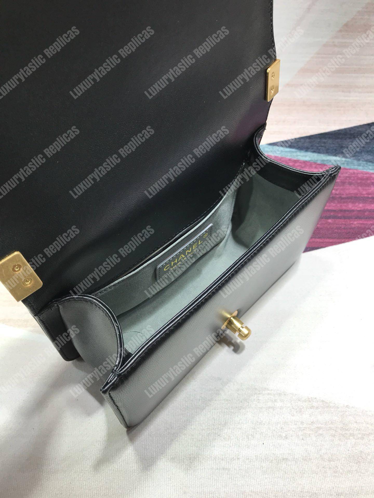 small boy Ch*el handbag black-gold ruthenium