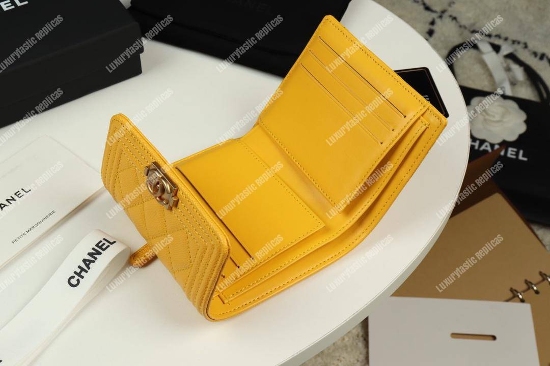 Ch*el boy small flap wallet yellow