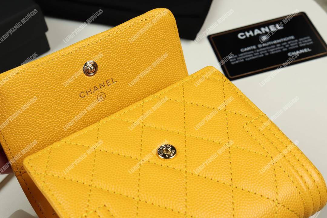 Ch*el boy small flap wallet yellow