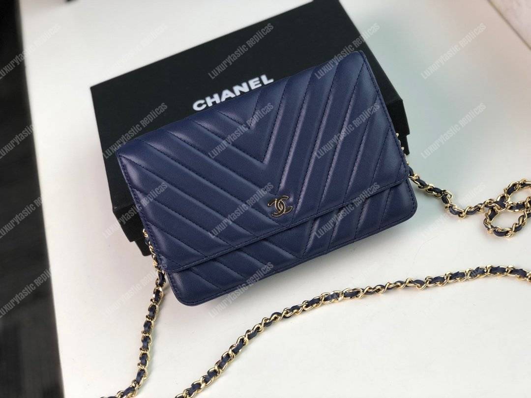 Ch*el wallet on chain – woc chevron lambskin dark blue gold-toned