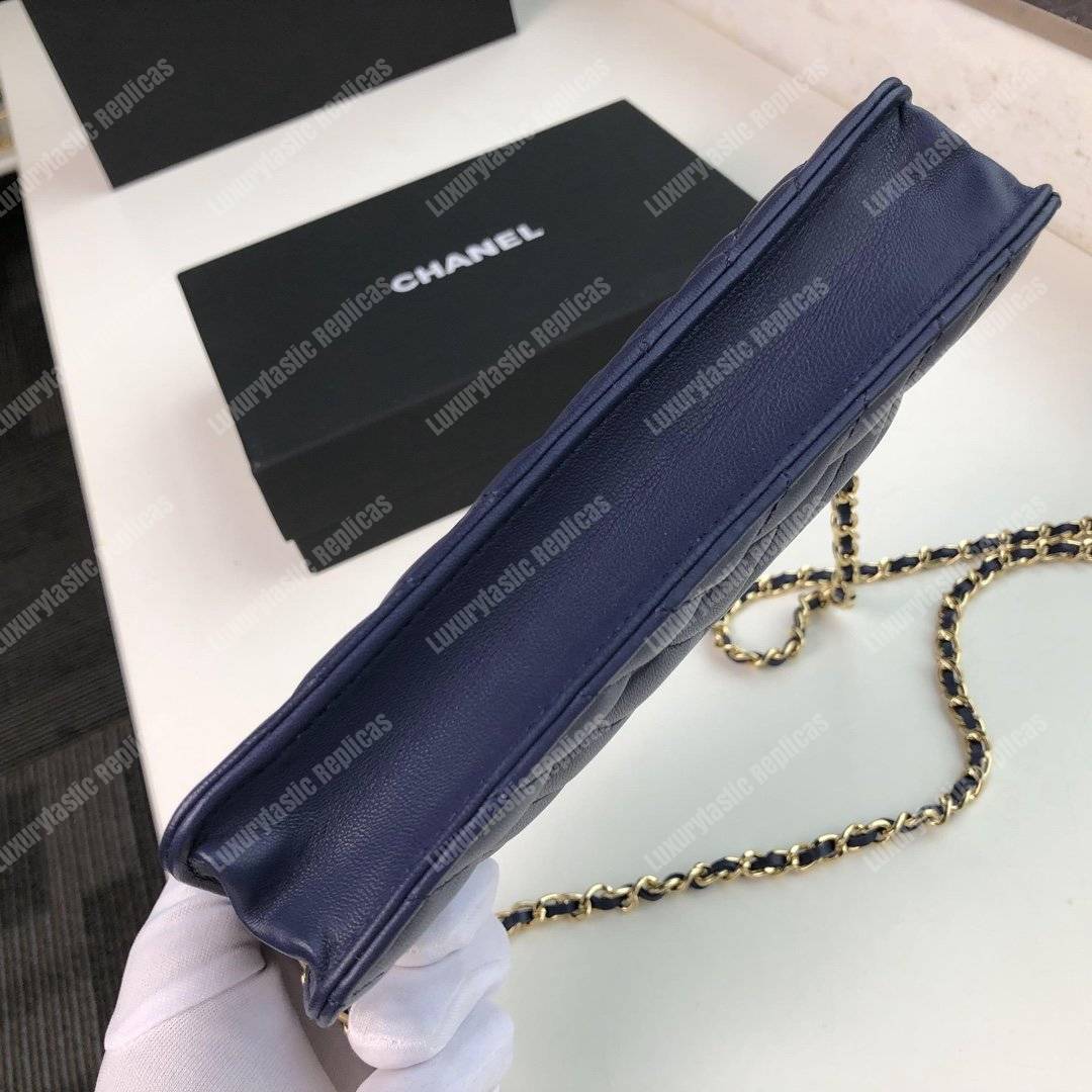 Ch*el wallet on chain – woc chevron lambskin dark blue gold-toned