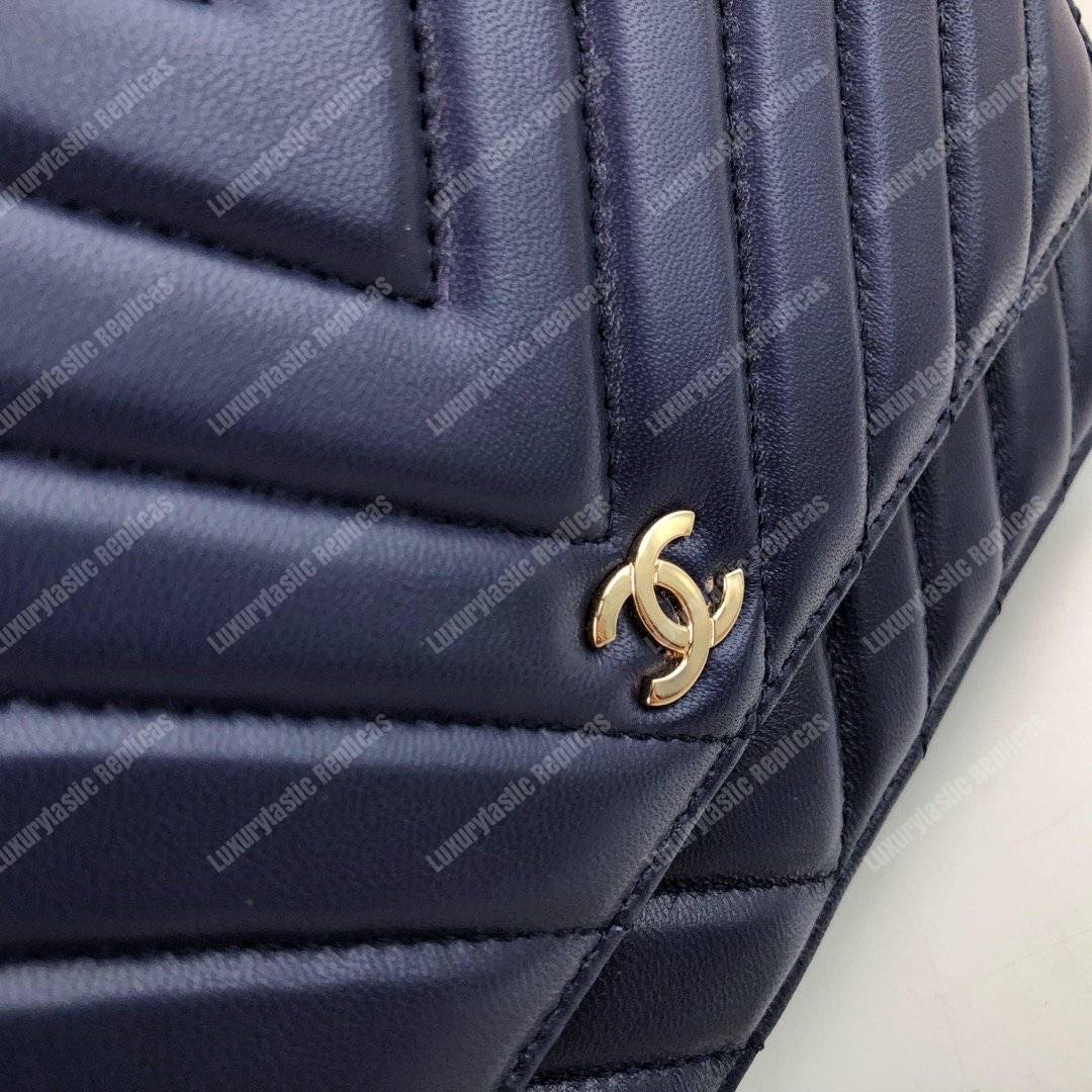 Ch*el wallet on chain – woc chevron lambskin dark blue gold-toned