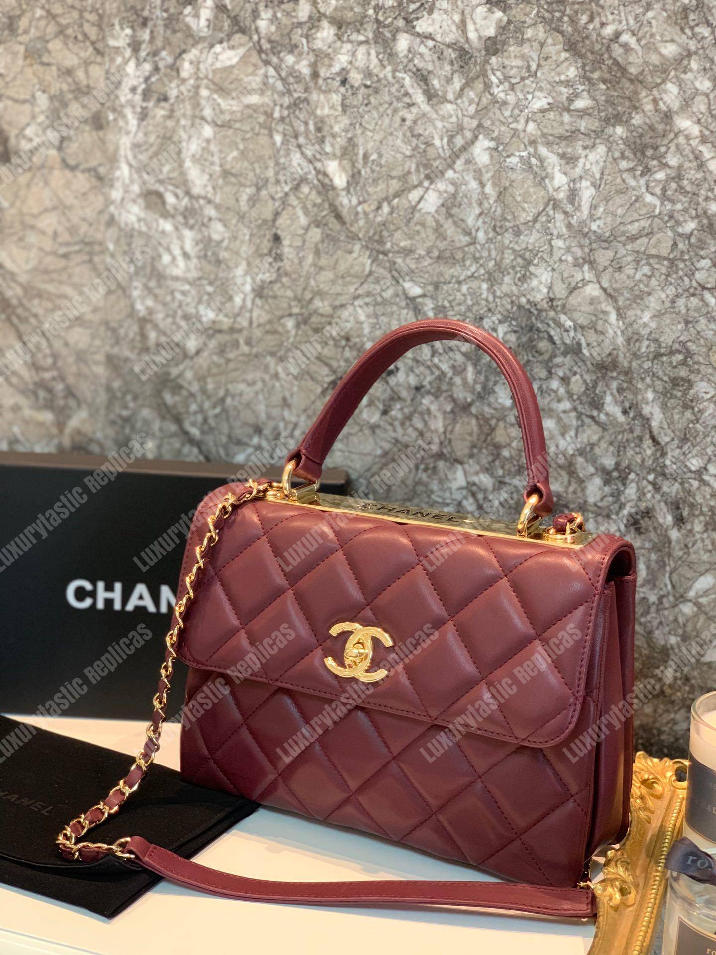 Ch*el small flap bag with top handle burgundy-gold
