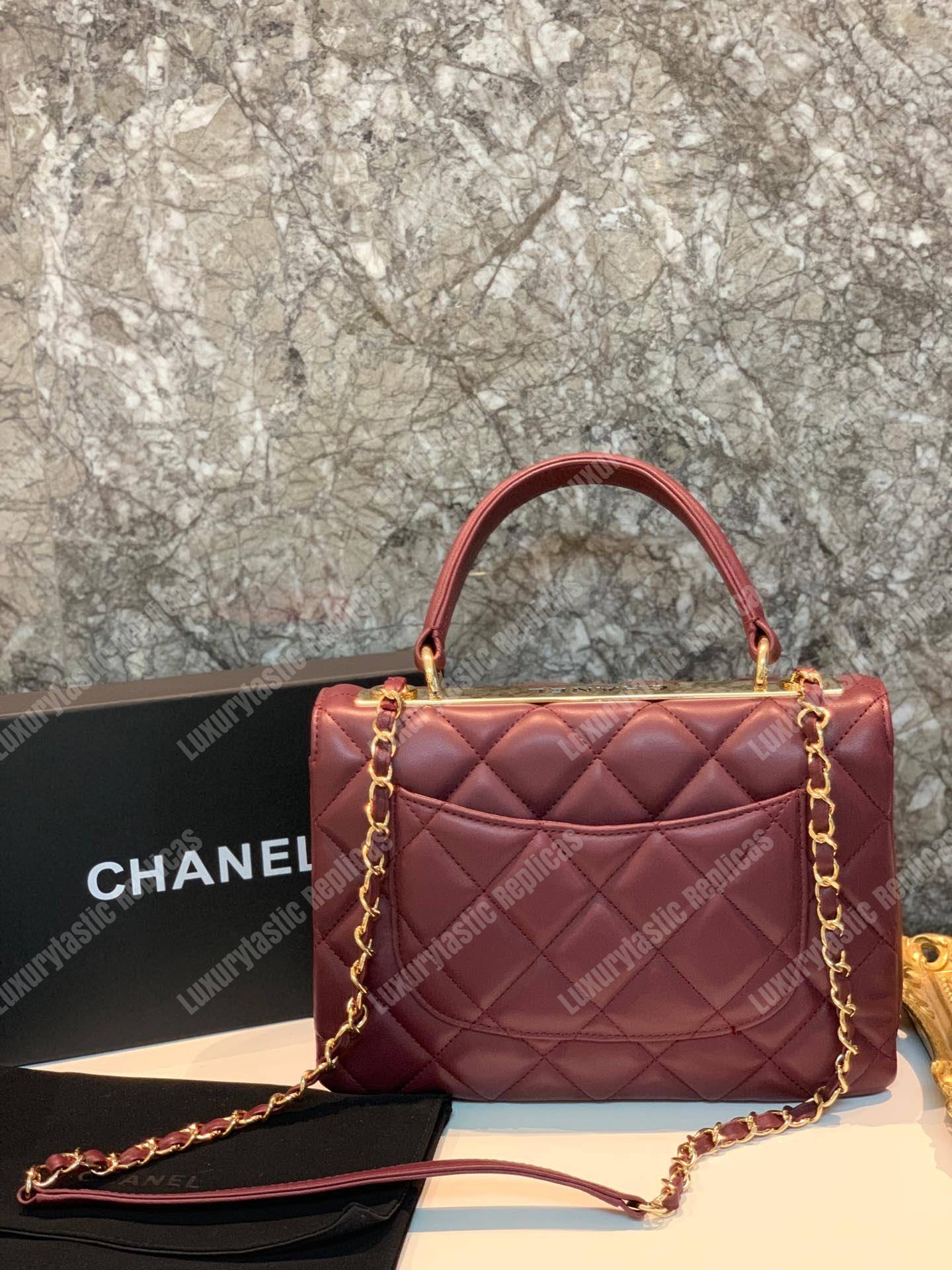 Ch*el small flap bag with top handle burgundy-gold