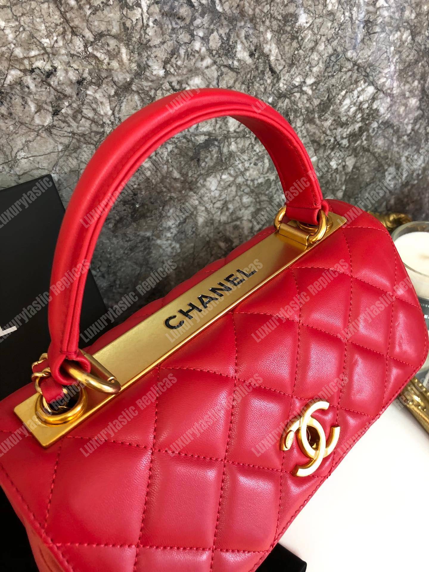 Ch*el small flap bag with top handle red-gold