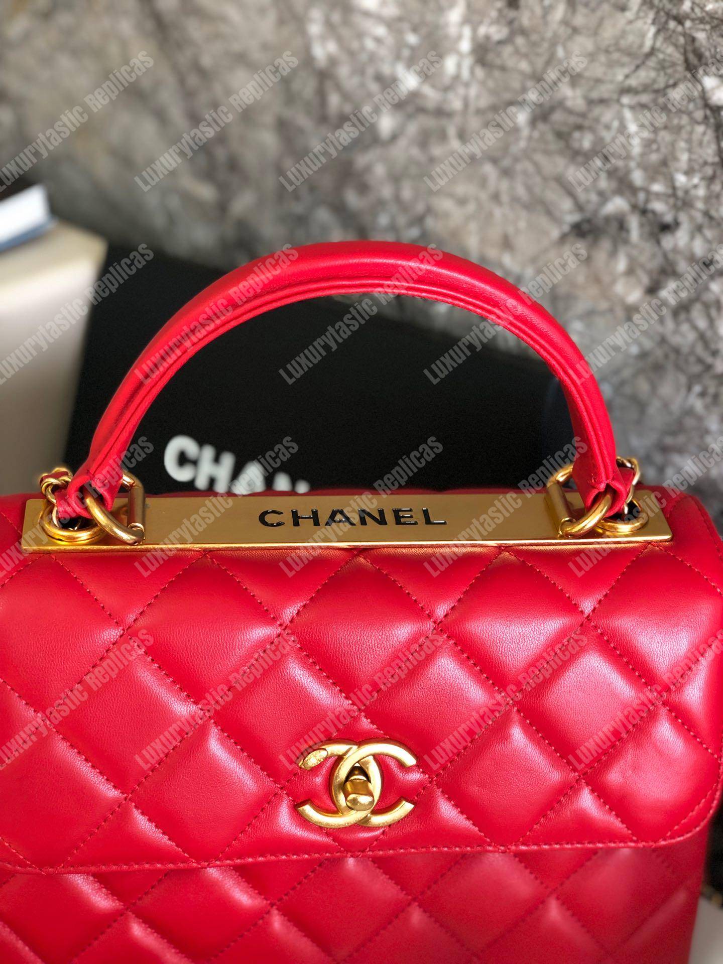 Ch*el small flap bag with top handle red-gold
