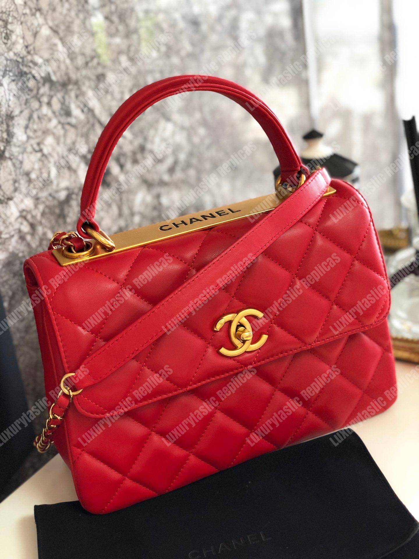 Ch*el small flap bag with top handle red-gold