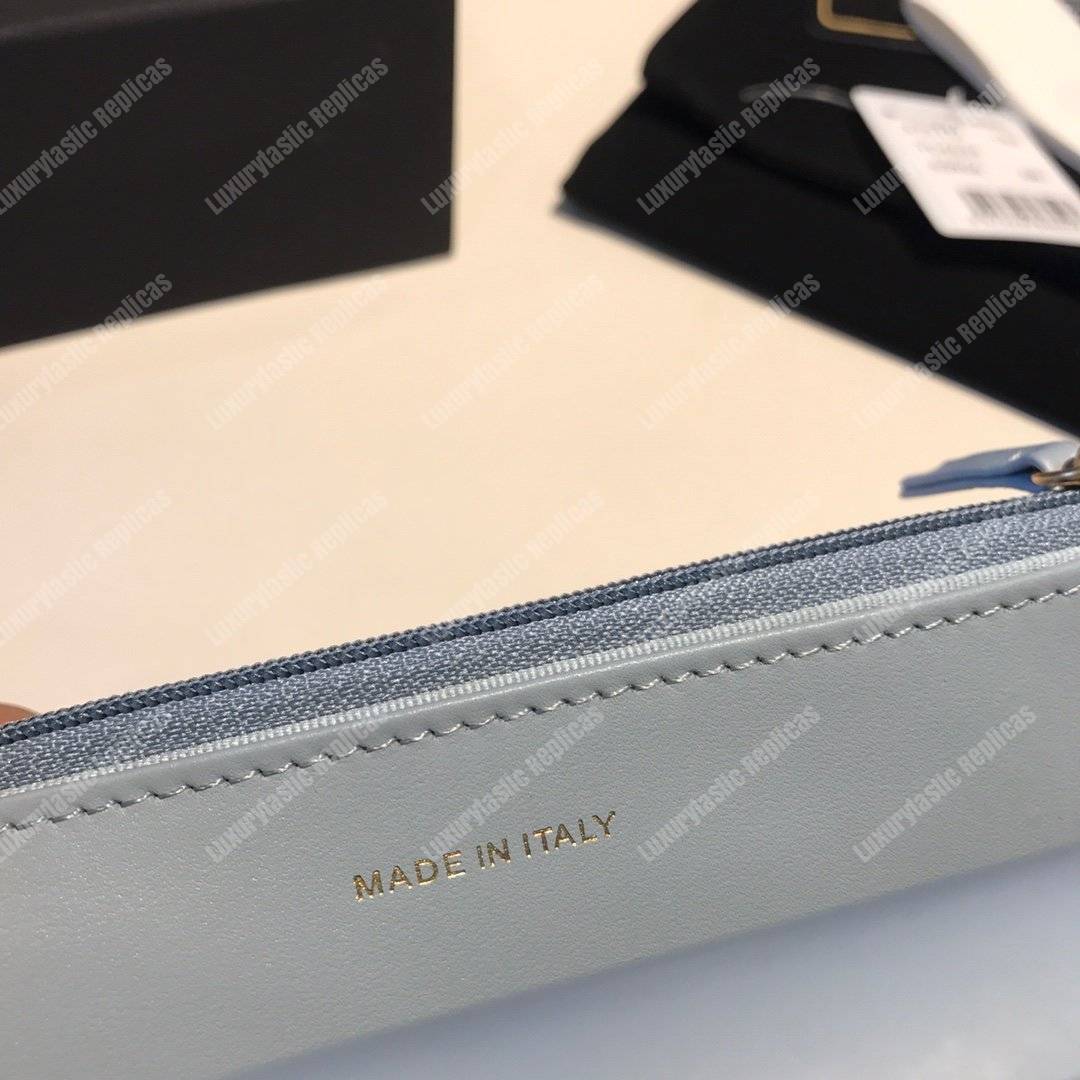 Ch*el wallet on chain – woc aged calfskin light blue