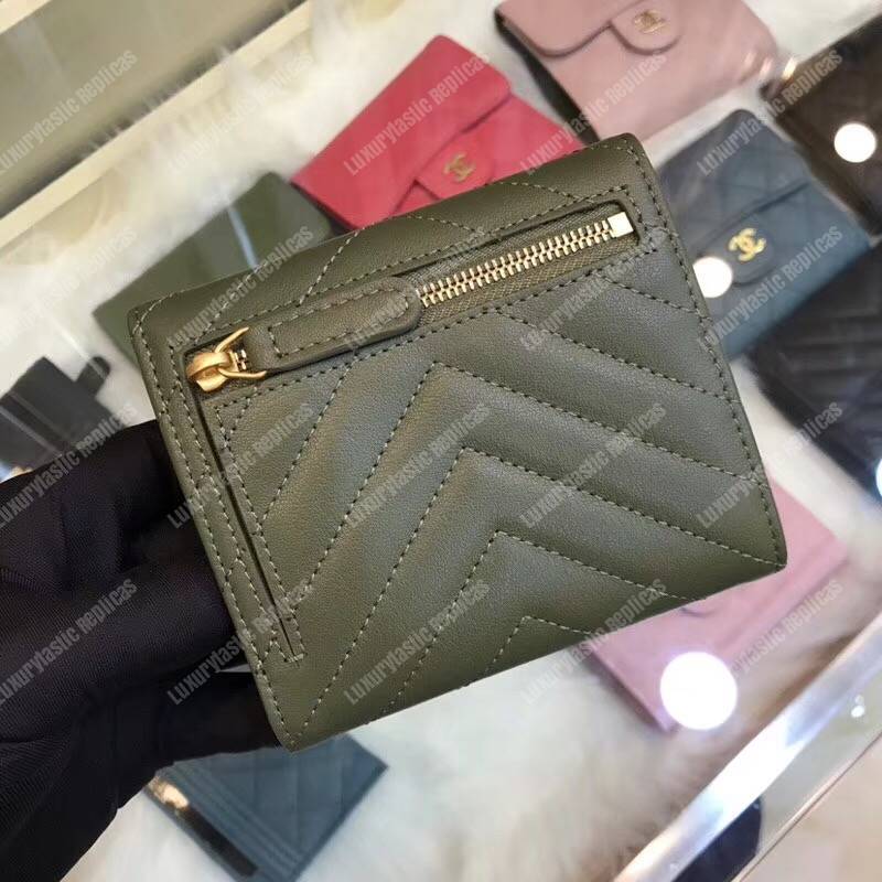 Ch*el classic small flap wallet dark green