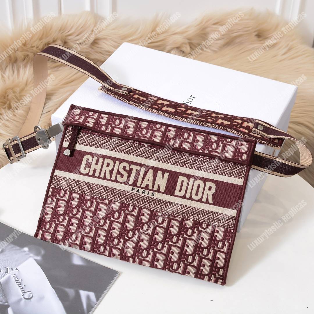 D*or burgundy oblique embroidered canvas clutch