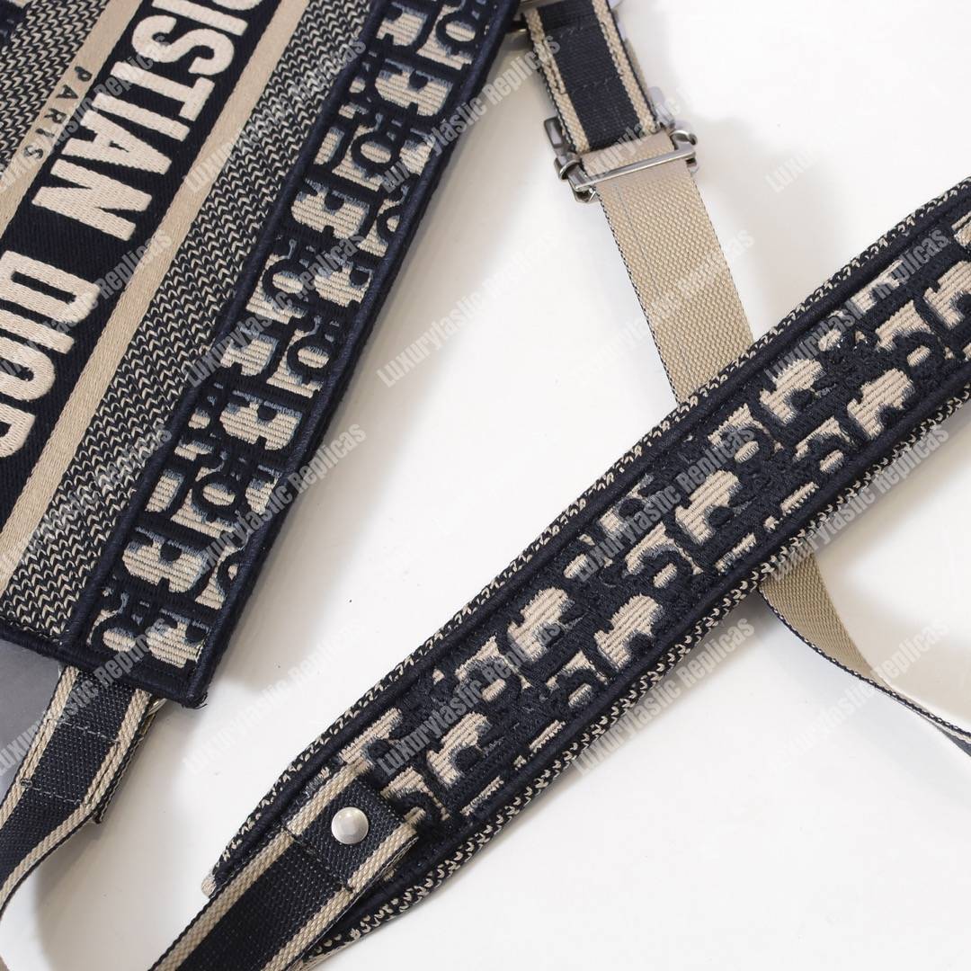 D*or blue oblique embroidered canvas clutch