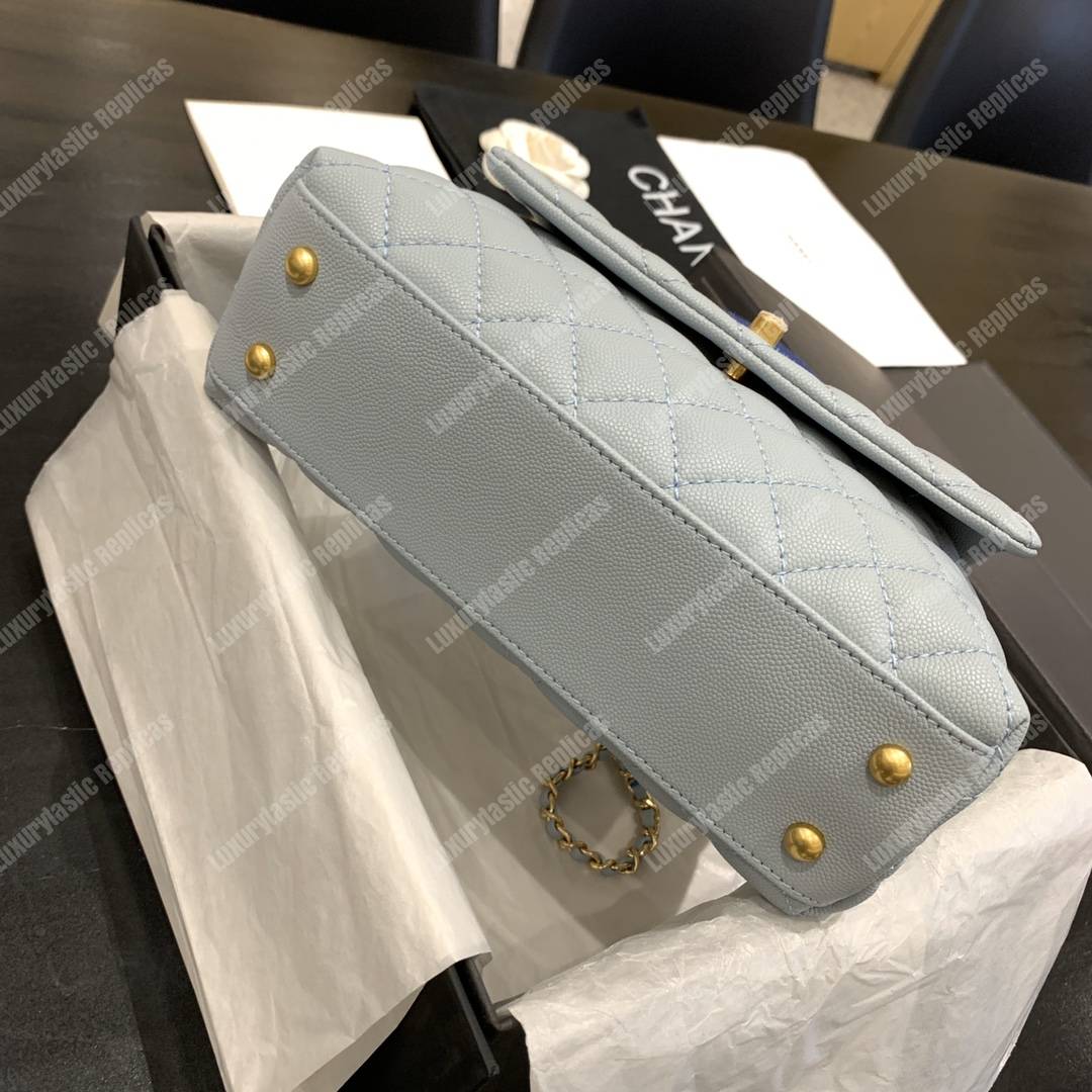 Ch*el flap bag with top handle caviar leather sky blue