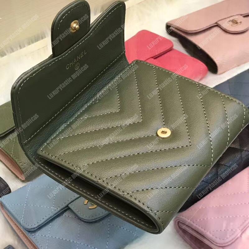 Ch*el classic small flap wallet dark green