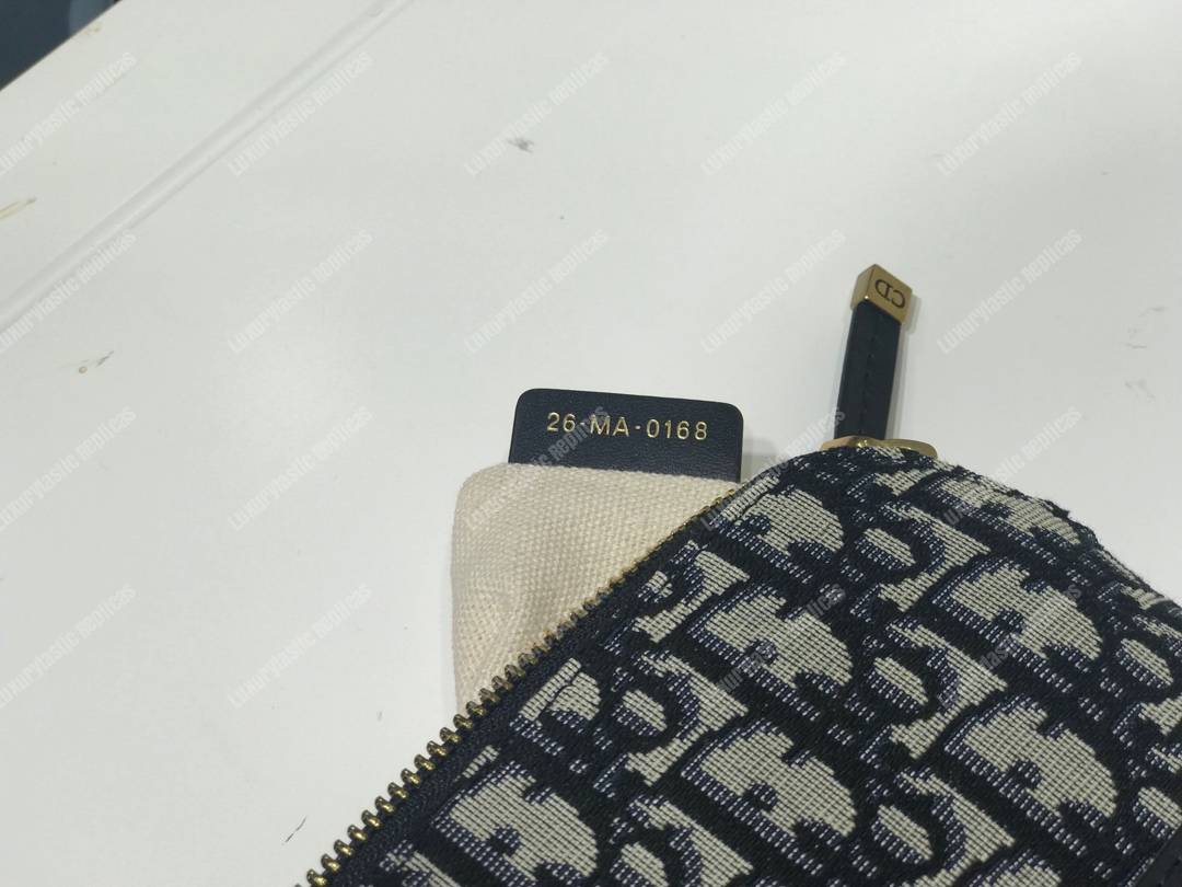 D*or travel kit in blue oblique canvas