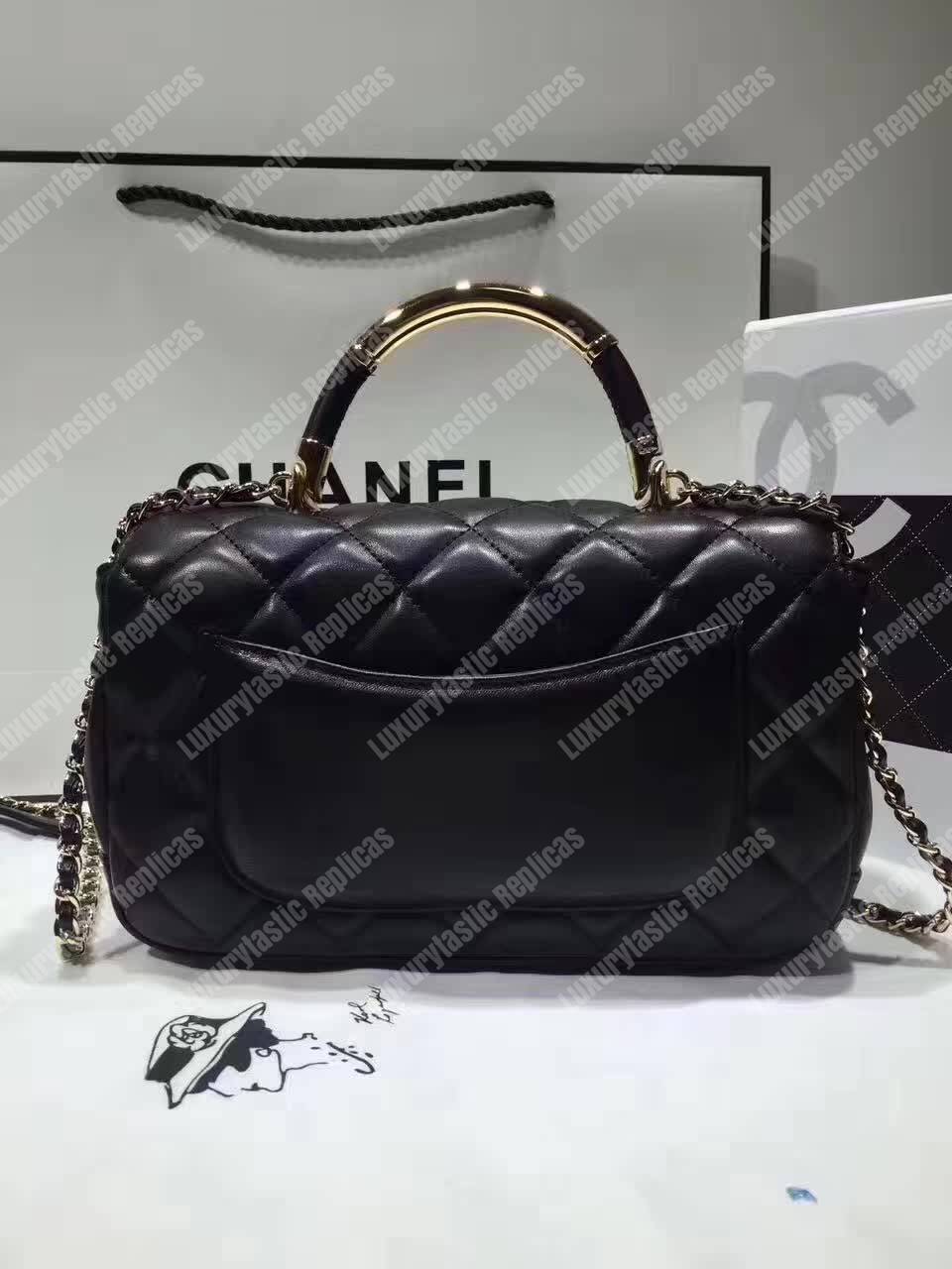 Ch*el medium flap bag with top handle black