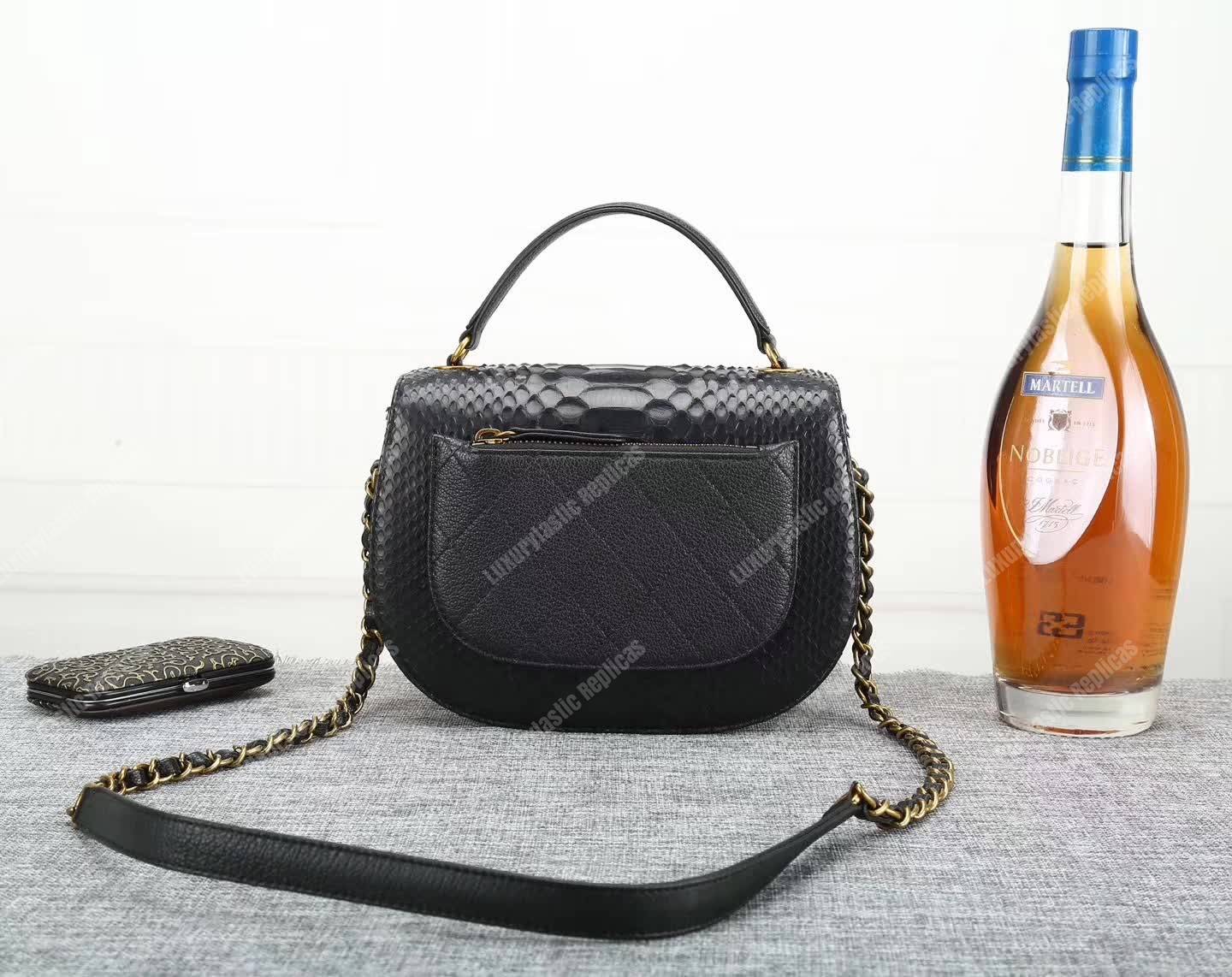Ch*el medium flap bag with top handle black