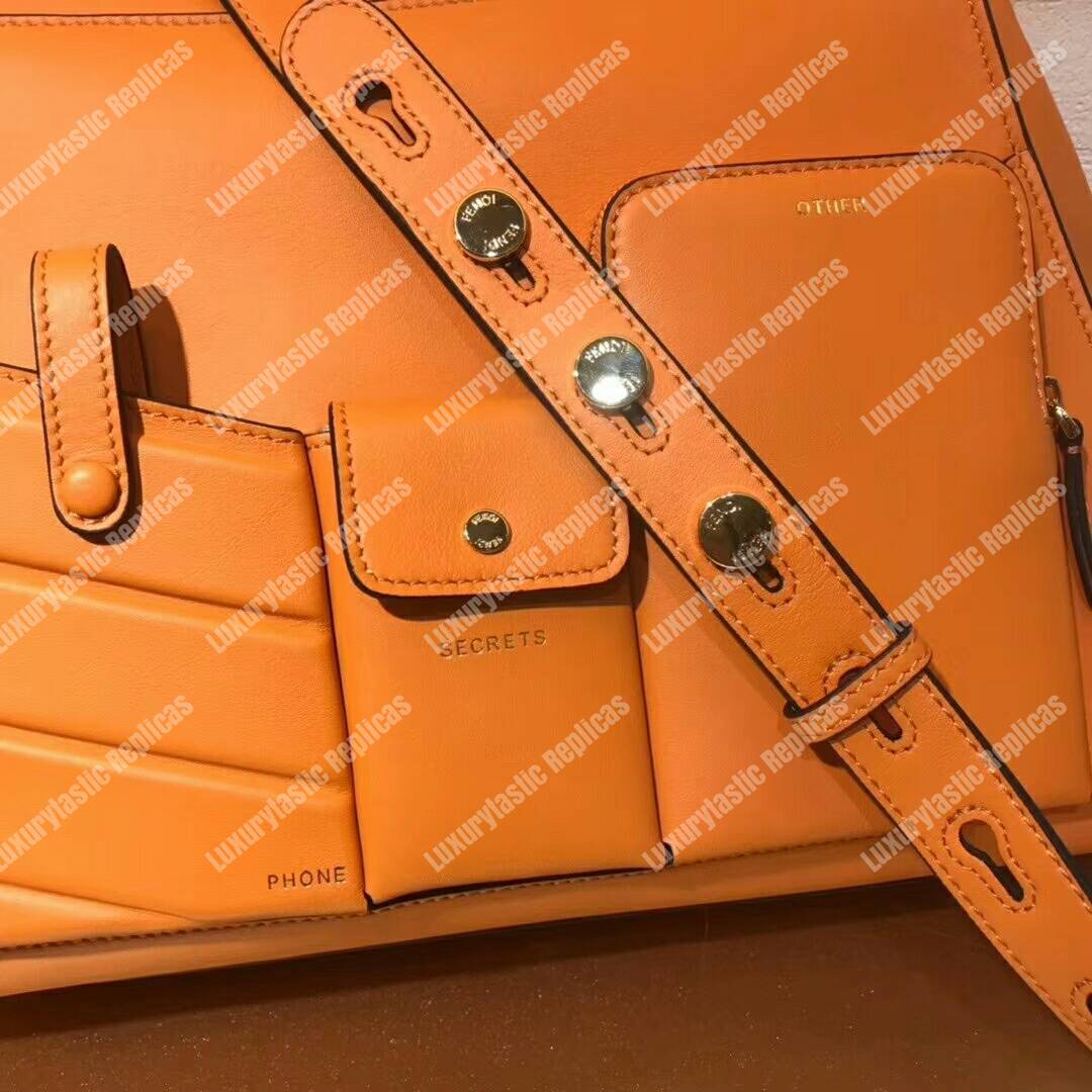 F**di peekaboo iconic medium orange leather bag
