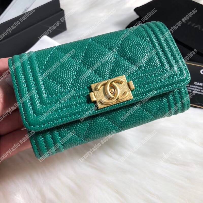 Ch*el boy small flap wallet green