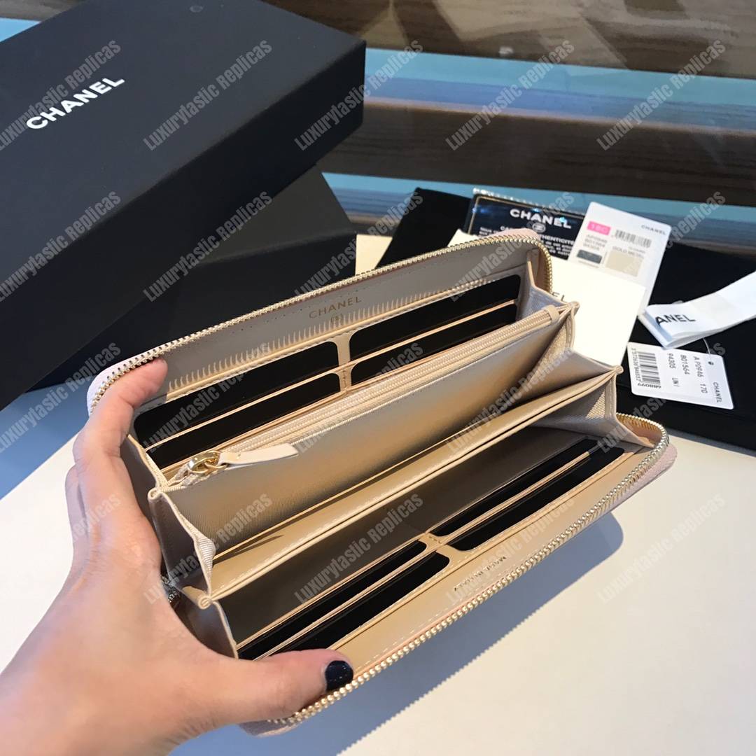 Ch*el 19 long zipped wallet light beige