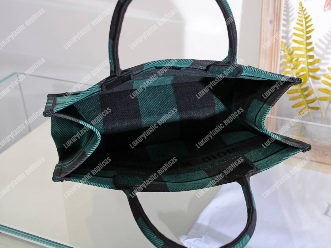 mini D*or book tote in green & black embroidered canvas