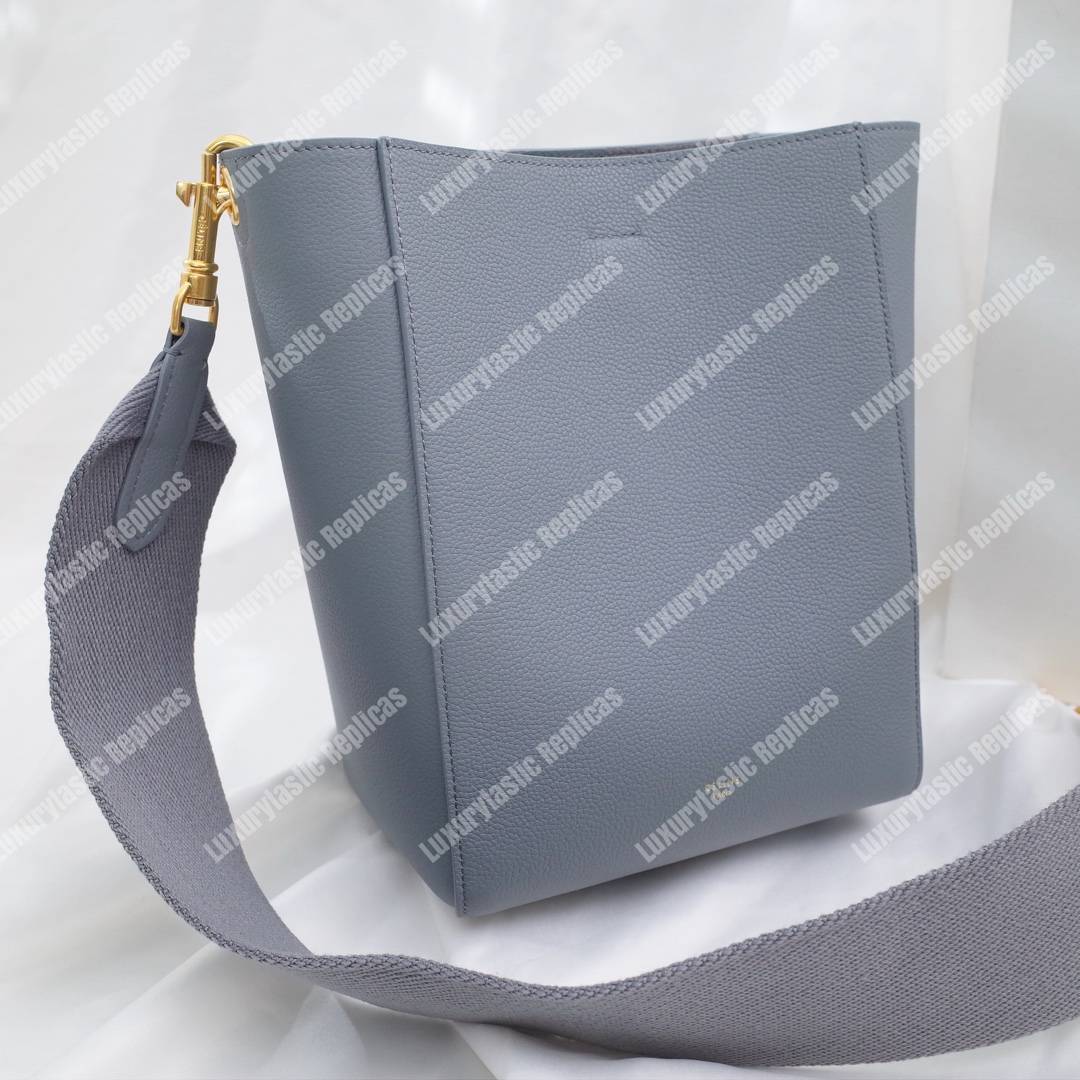 Ce**e sangle small bucket bag in soft grained calfskin cloud