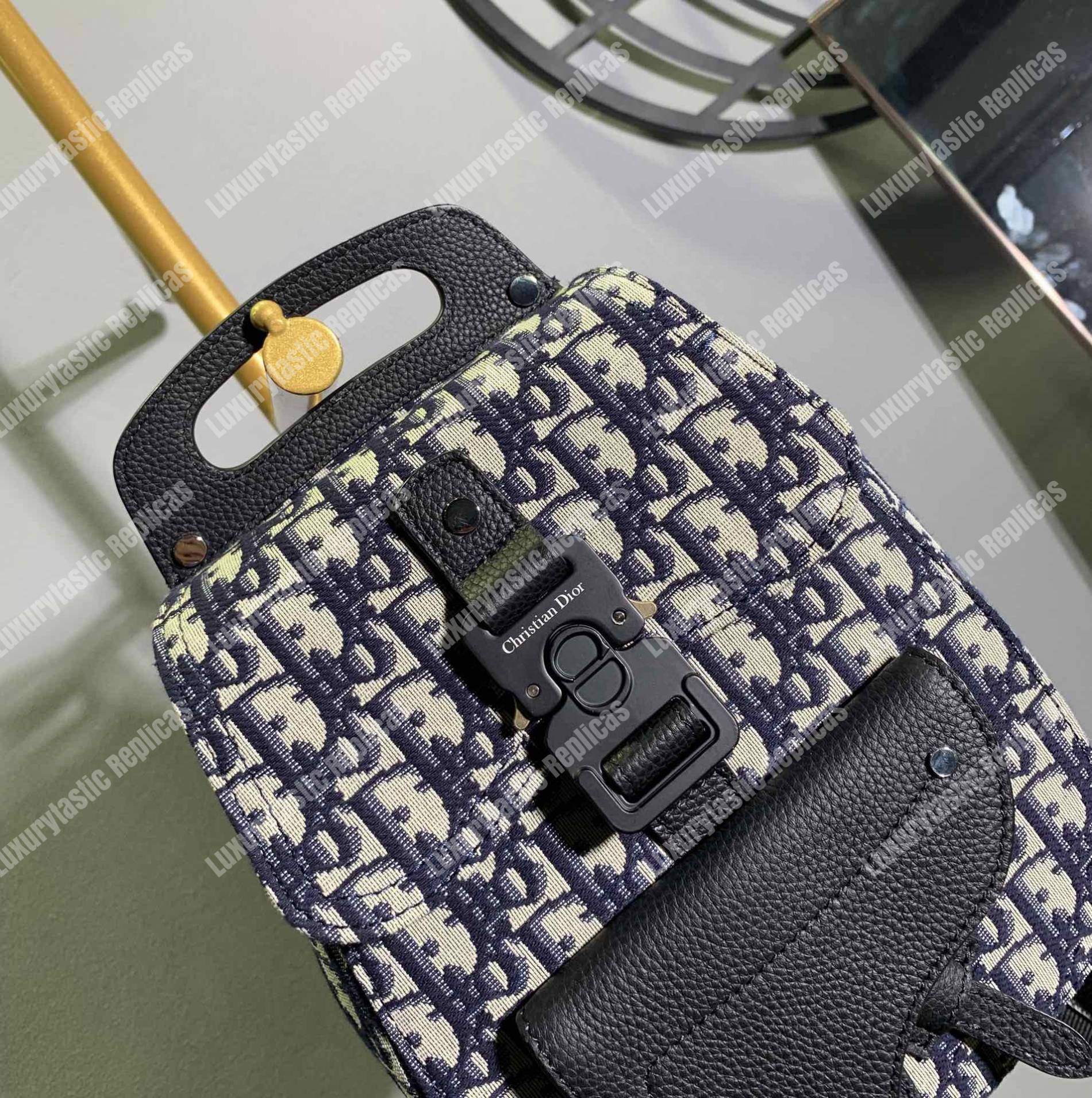 D*or navy blue oblique jacquard mini saddle backpack