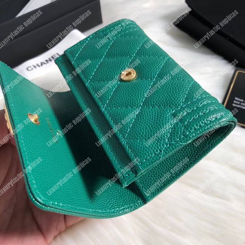 Ch*el boy small flap wallet green